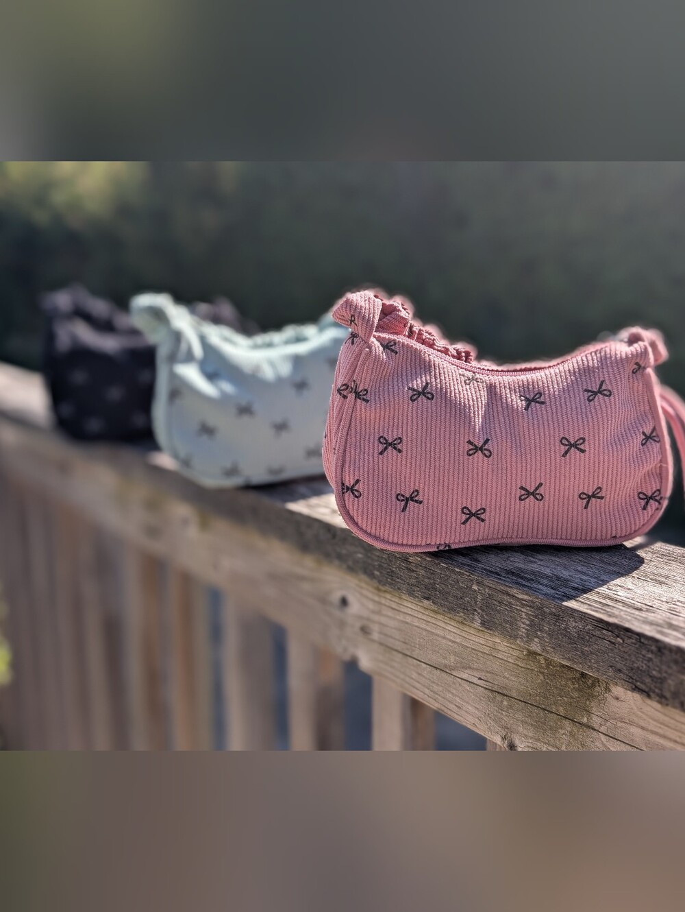 3 Bow-Print Mini Bags